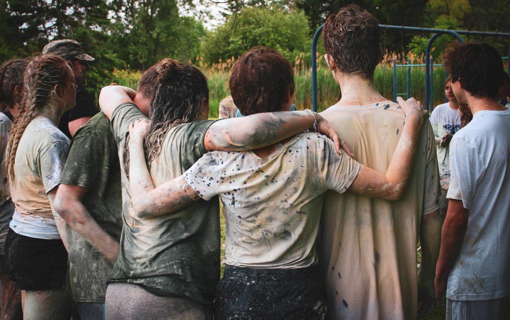 Students in a prayer circle after an event